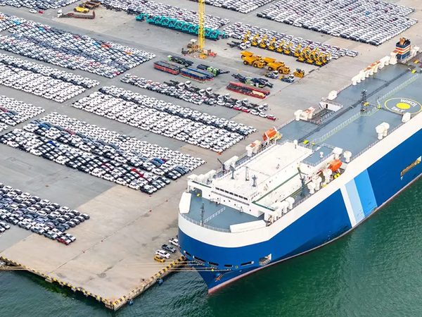Ro-ro vessel loading vehicles at the port